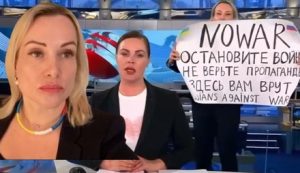 “No to war! Do not believe the propaganda!: A girl with a poster "No to war" broke into the air of RosTV "Channel One"
