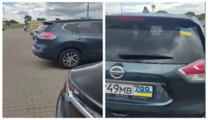 Россияне в Польше начали прятать флаг на номерах машин, наклеивая флаг Украины