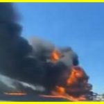 The rescue plane burst into flames in the air and crashed right onto the highway