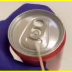 How do different cleaning methods affect the microbial contamination of Coca-Cola aluminum cans?