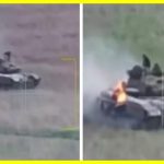 A Ukrainian soldier extinguished his burning tank right on the move