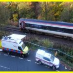 Two trains collide in Britain, one dead, 15 injured