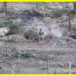 A Ukrainian defender stops a Russian occupant in hand-to-hand combat