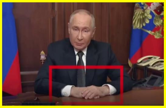 Putin did not move his hands once during the address