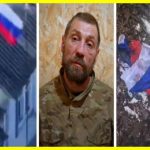 Ukrainian military captured standard-bearer with Russian tricolor