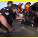 French police slash migrant boat and drag passengers back to shore