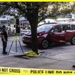 Car drives into crowd of people