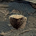 A mysterious triangular pyramid on Mars in Valles Marineris