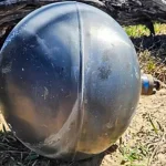 Mysterious metal spheres wash ashore on Australian beaches as experts investigate possible rocket debris