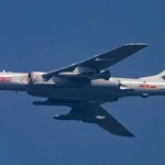 China reveals H-6N strategic bomber carrying a huge ballistic missile believed to be the JL-1