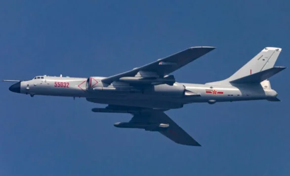 China reveals H-6N strategic bomber carrying a huge ballistic missile believed to be the JL-1