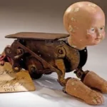 The story behind a 150-year-old mechanical doll that crawls like a real baby