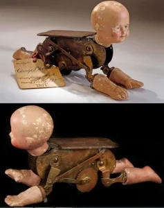 The story behind a 150-year-old mechanical doll that crawls like a real baby